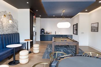 A room with a pool table and a bar at The Crest at South Point Apartments, Georgia, 30253